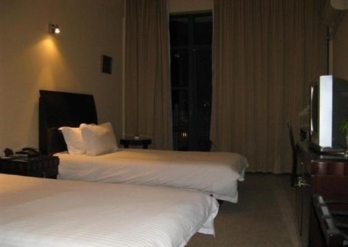 شانغهاي Baolong Homelike Hotel - Wusong Branch الغرفة الصورة